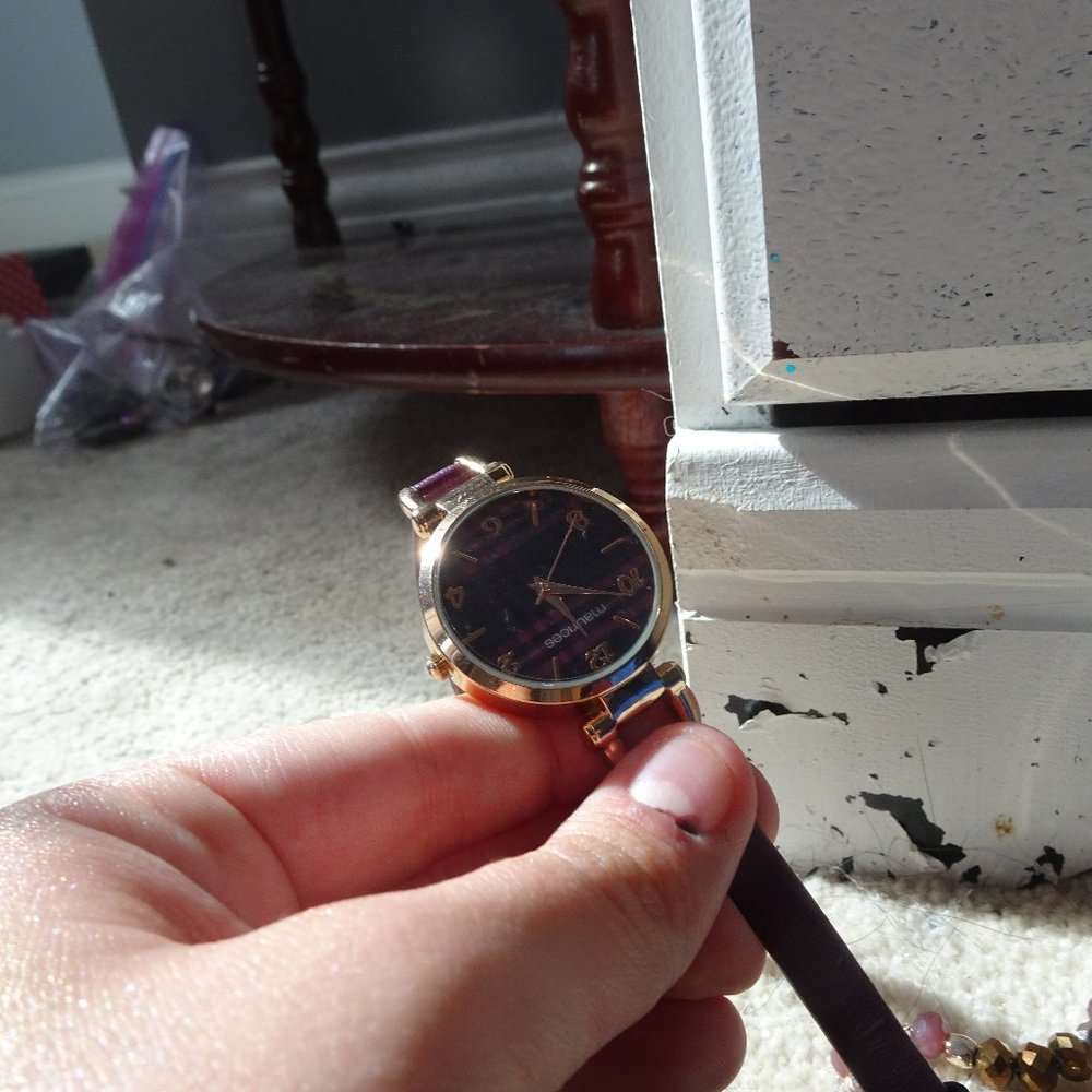 purple watch and bracelet